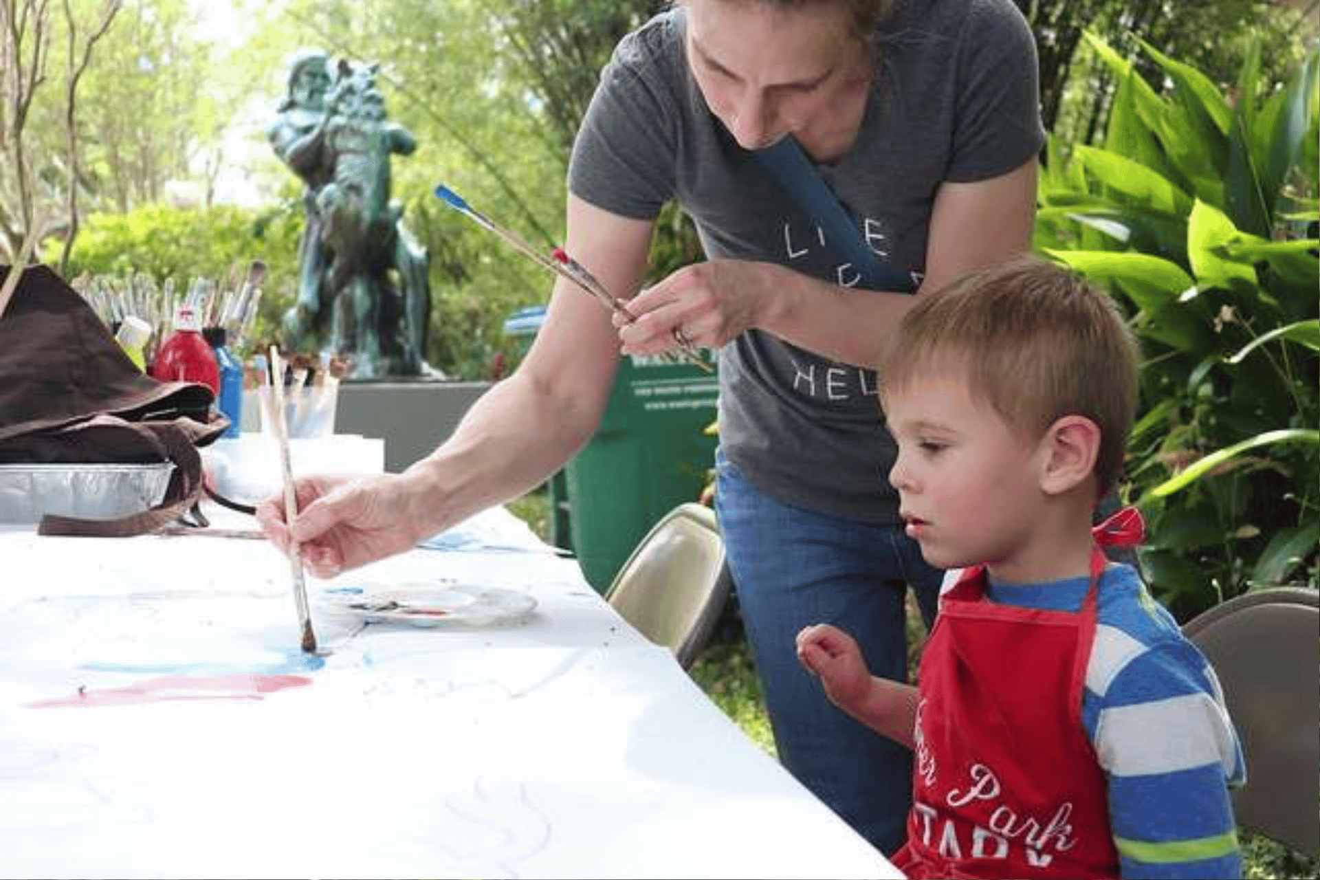 Family at outdoor painting class